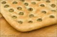 Focaccia con olive ---- 7 €/Kg 